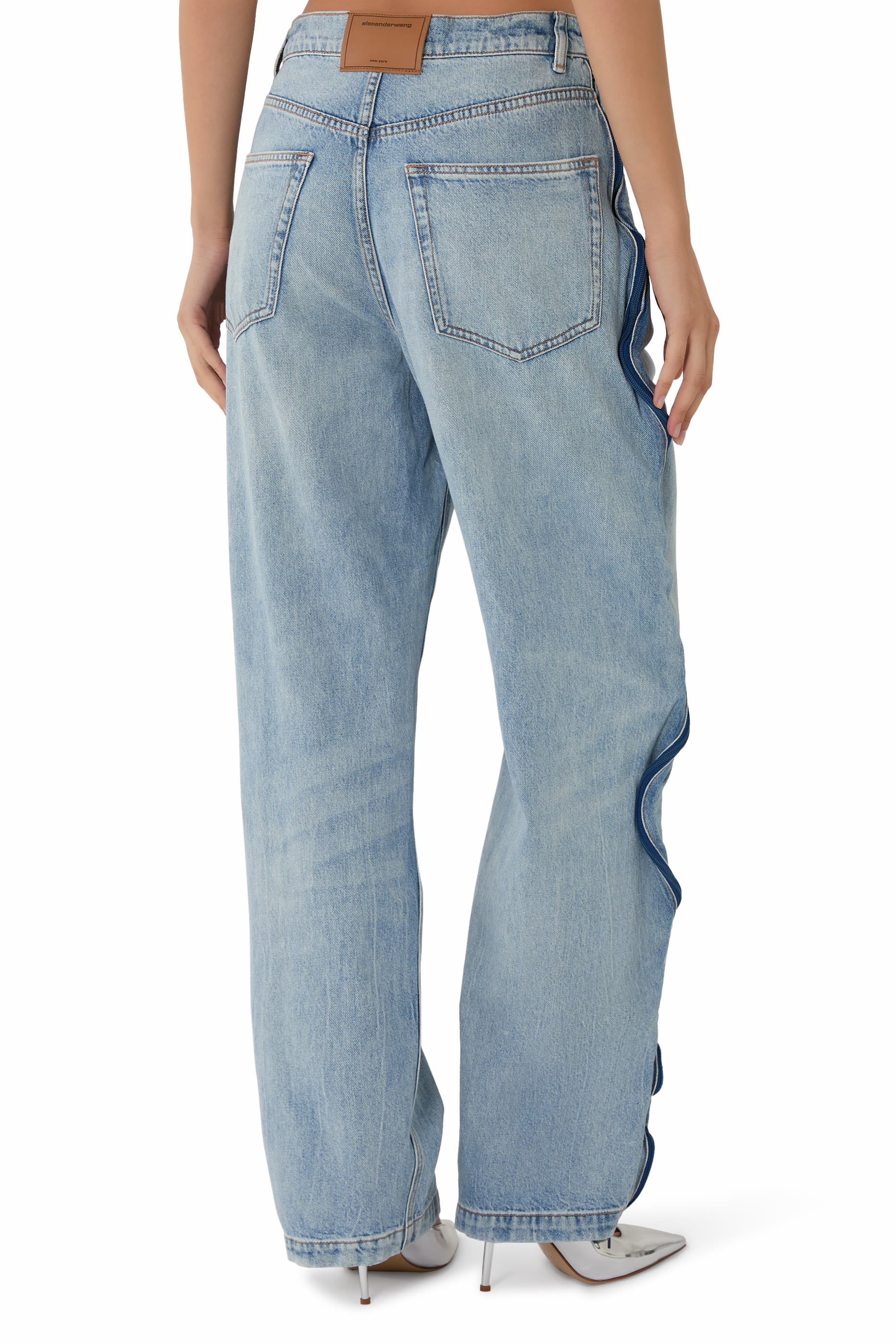 بنطال جينز بسحابات وتفاصيل مقوسة شبكية