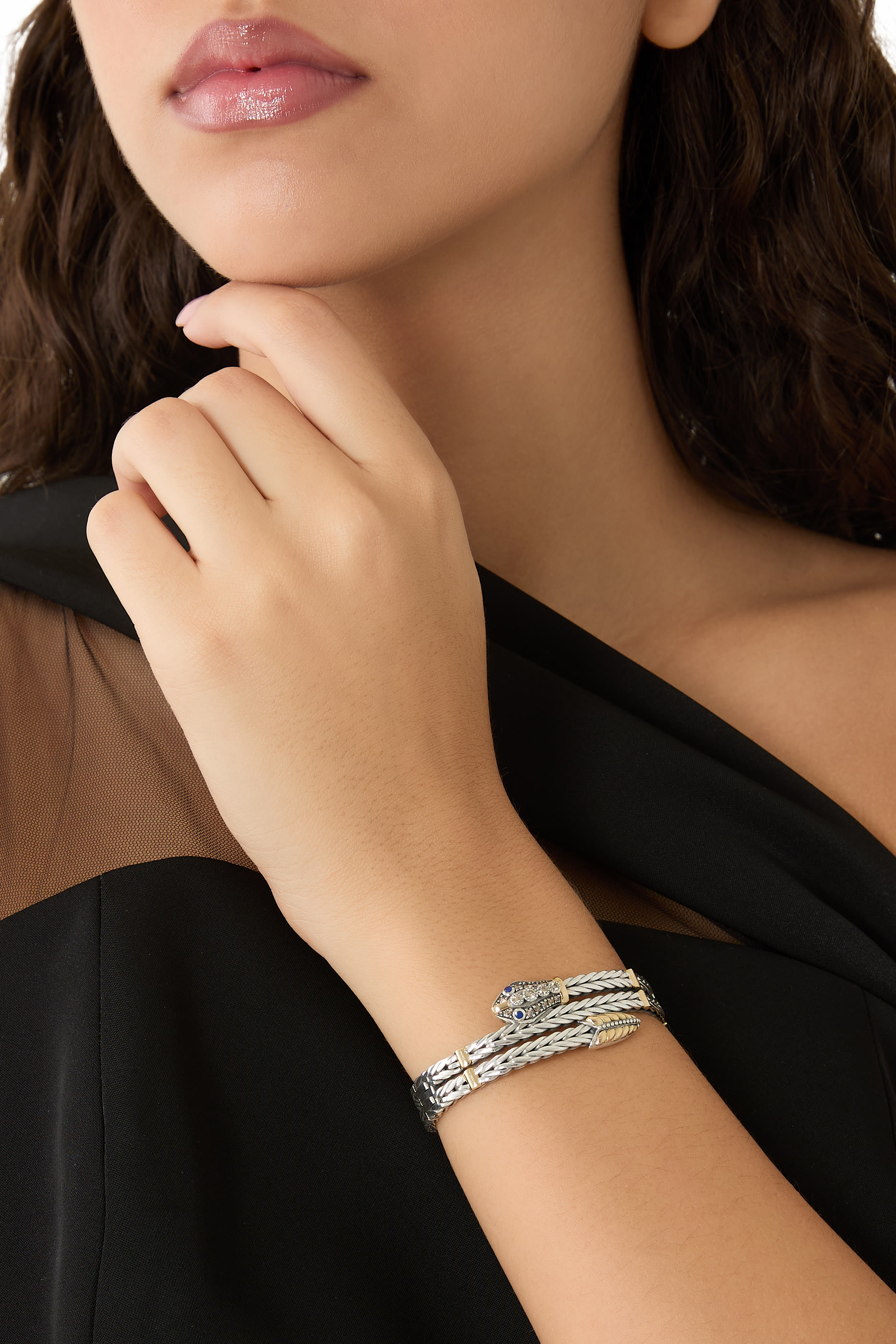 سوار بتصميم ثعبان روماني مرصع بأحجار لازورد، ذهب أصفر عيار 18 قيراط مع فضة إسترلينية