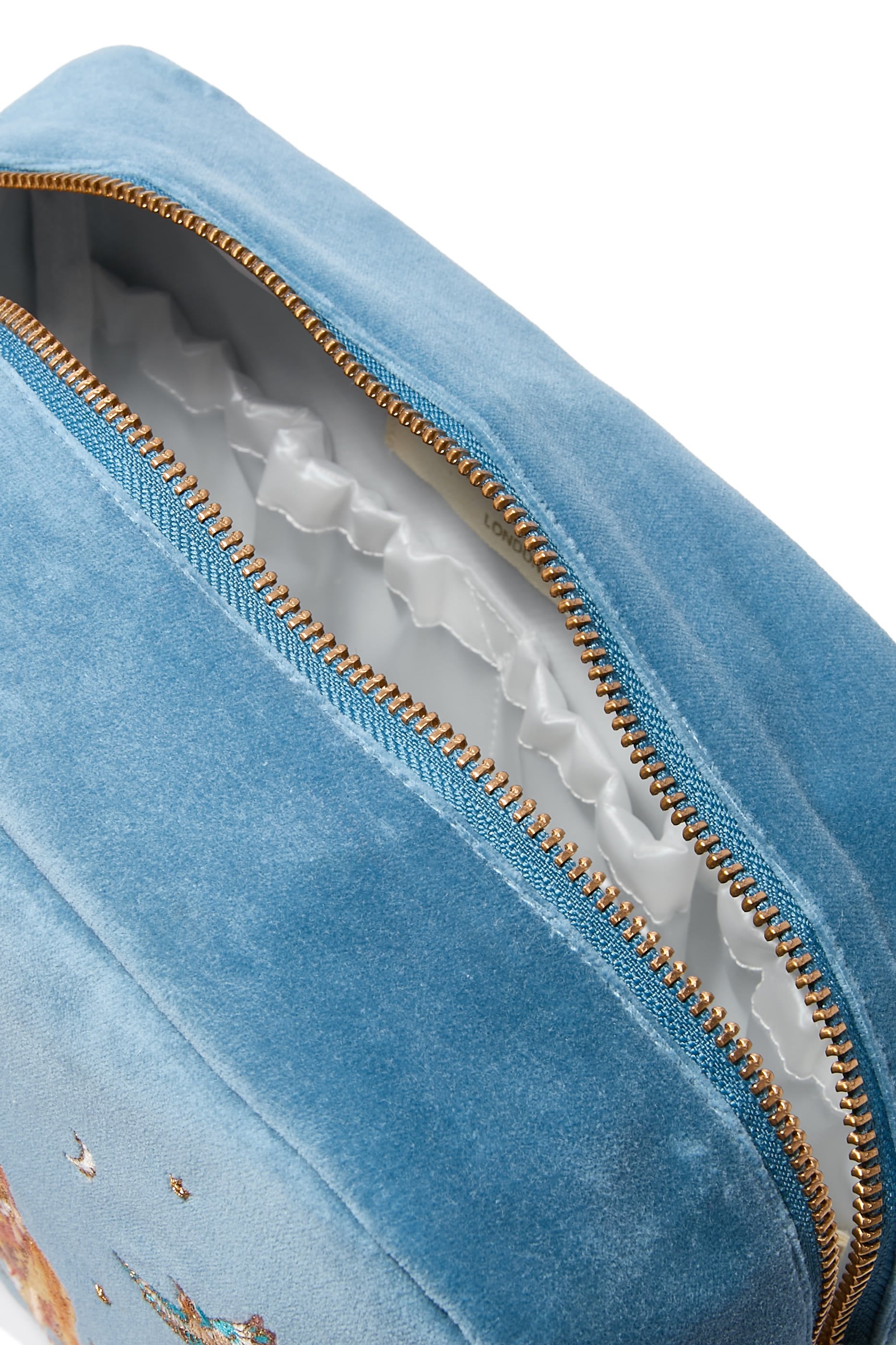 حقيبة مستحضرات عناية شخصية بتطريز بتصميم أسد