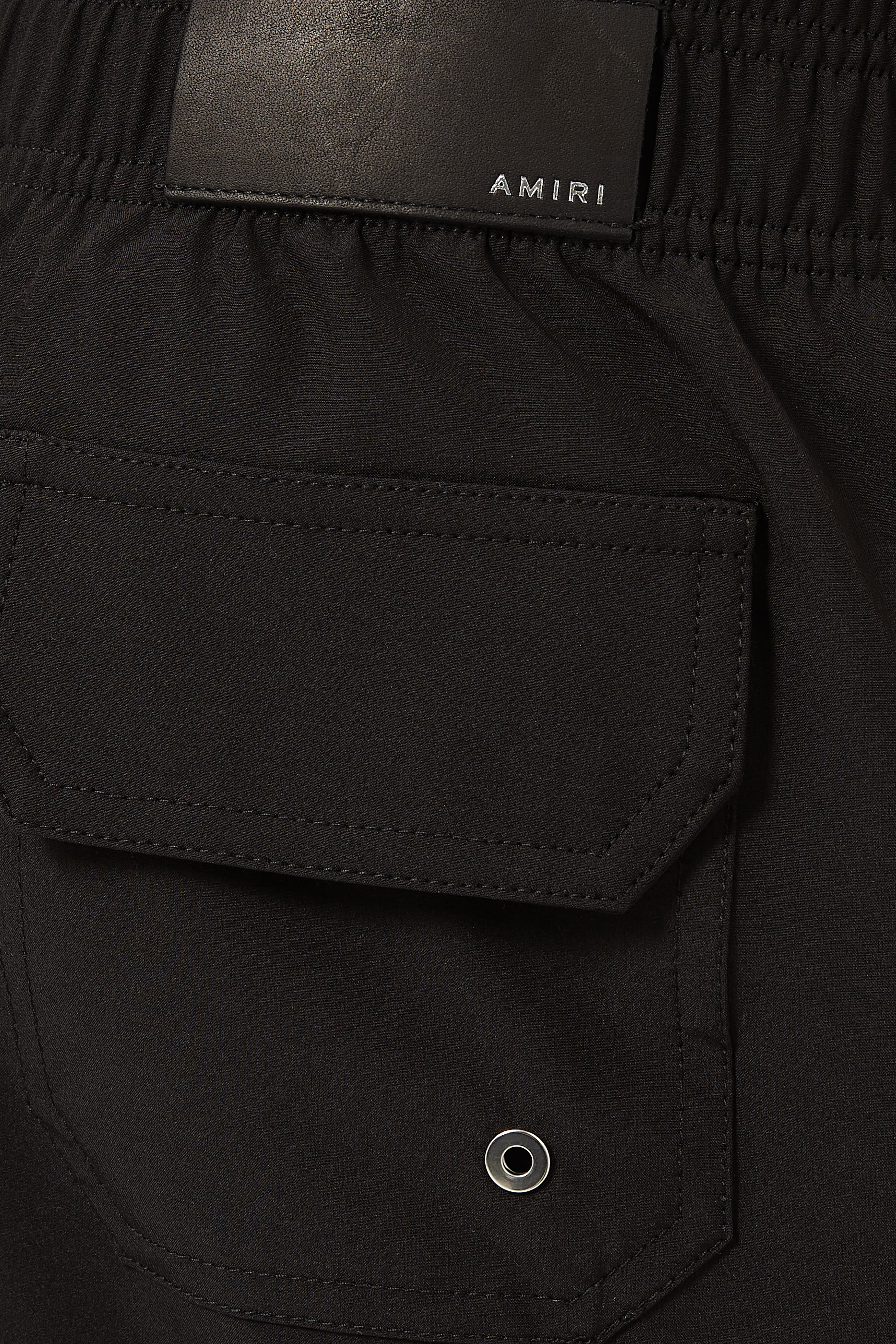 شورت سباحة بشعار الماركة