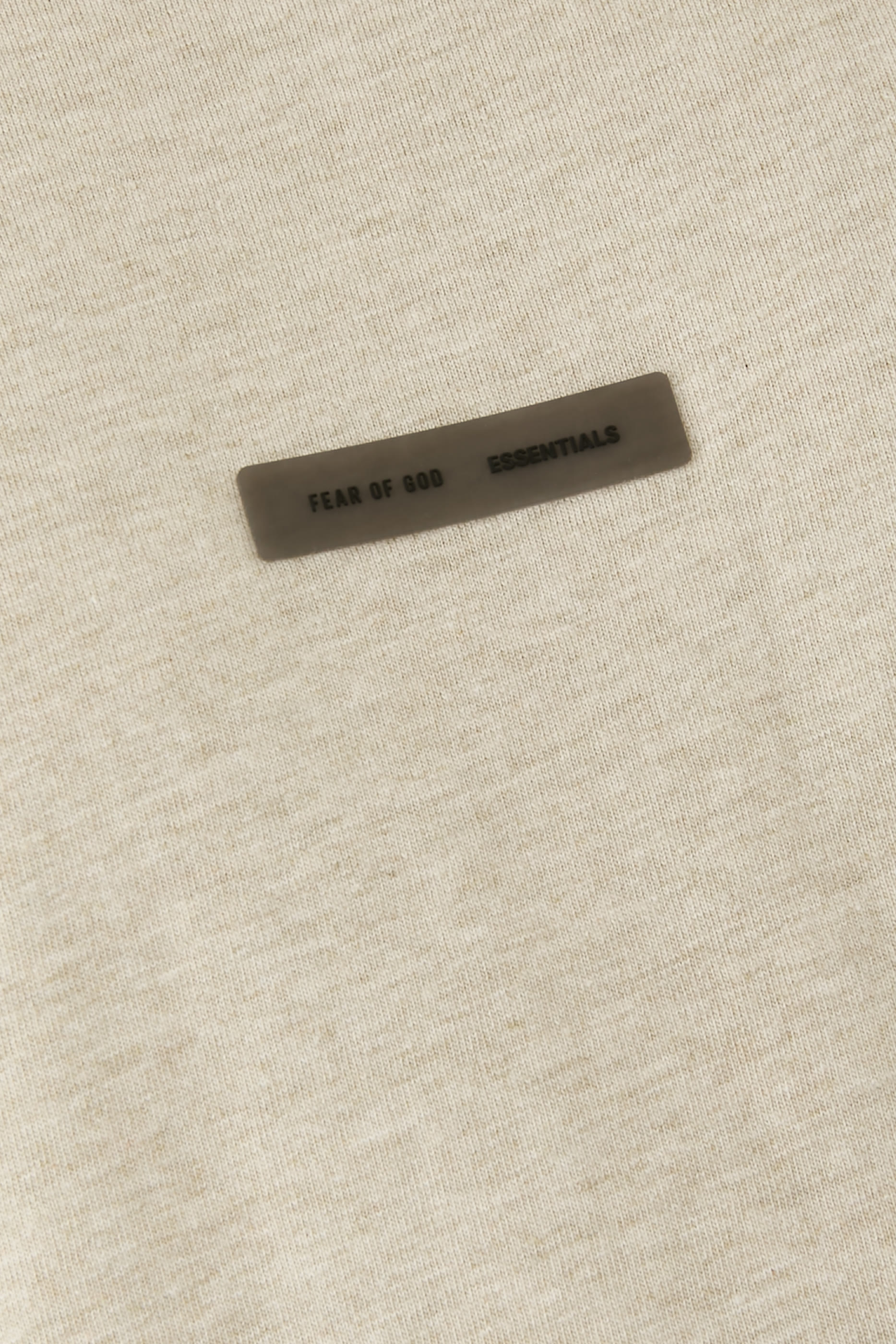 بلوزة بلا أكمام بشعار الماركة قماش خفيف الوزن