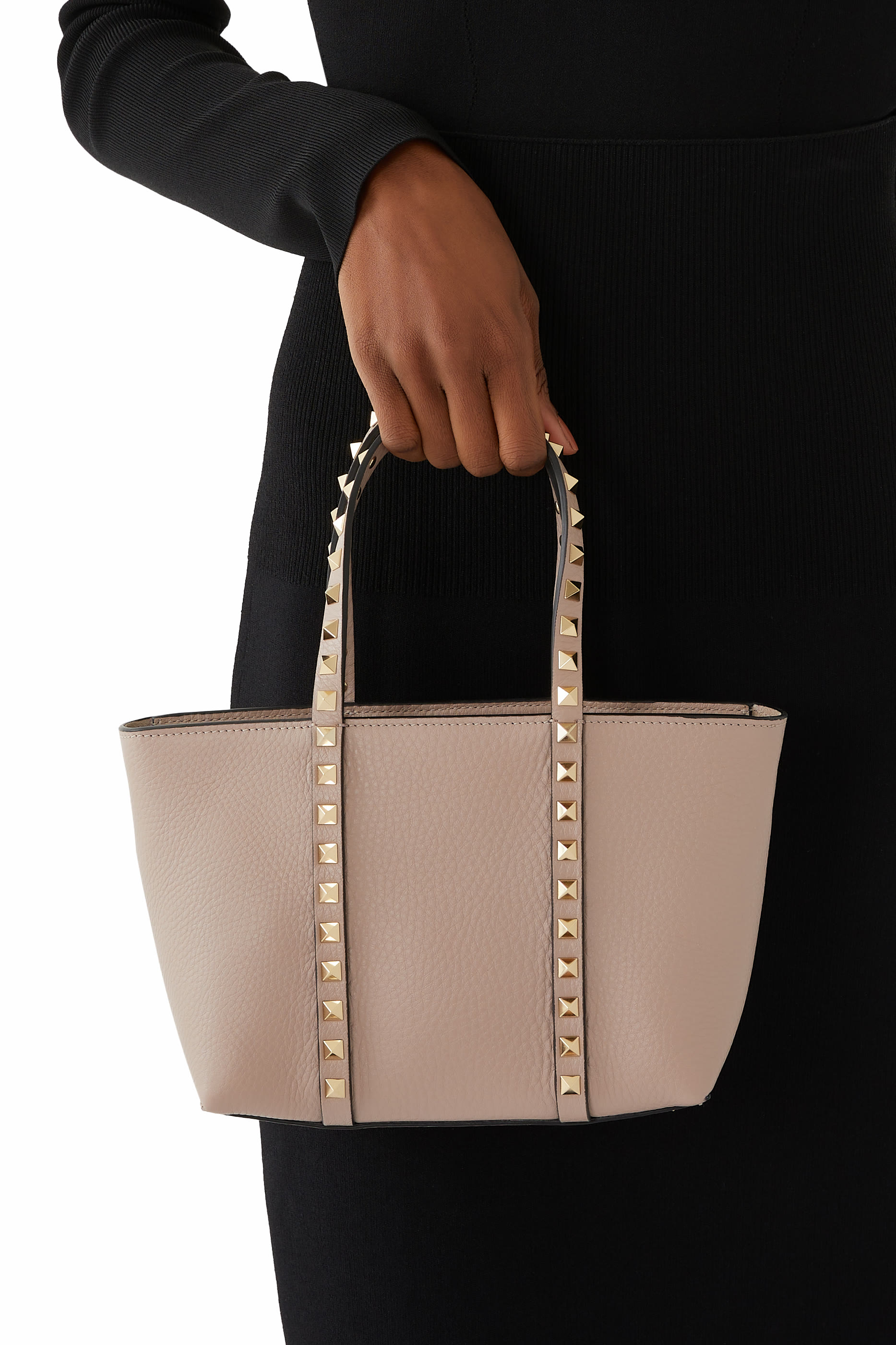 حقيبة يد بحلي هرمية جلد