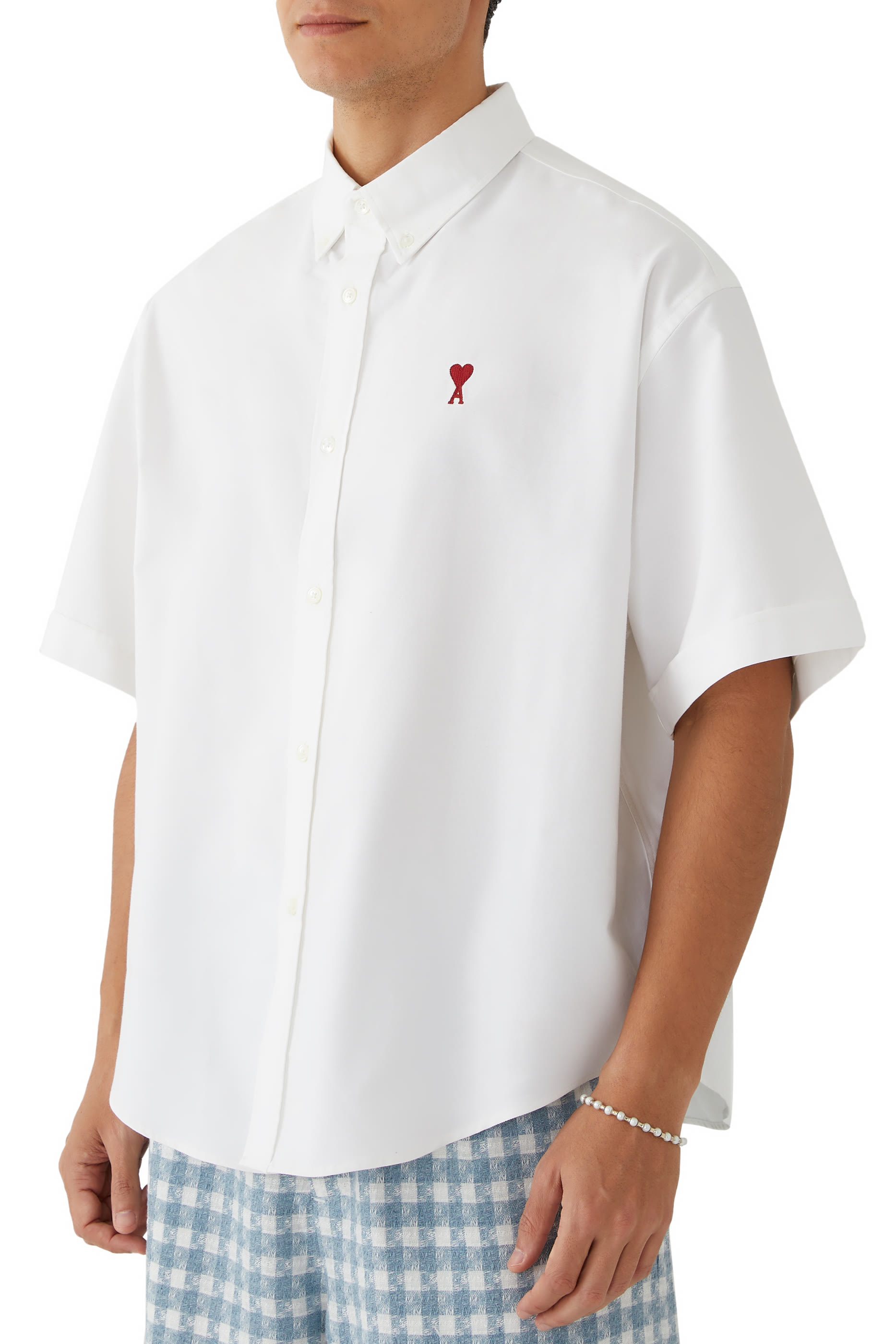 قميص بأكمام قصيرة قصة مربعة