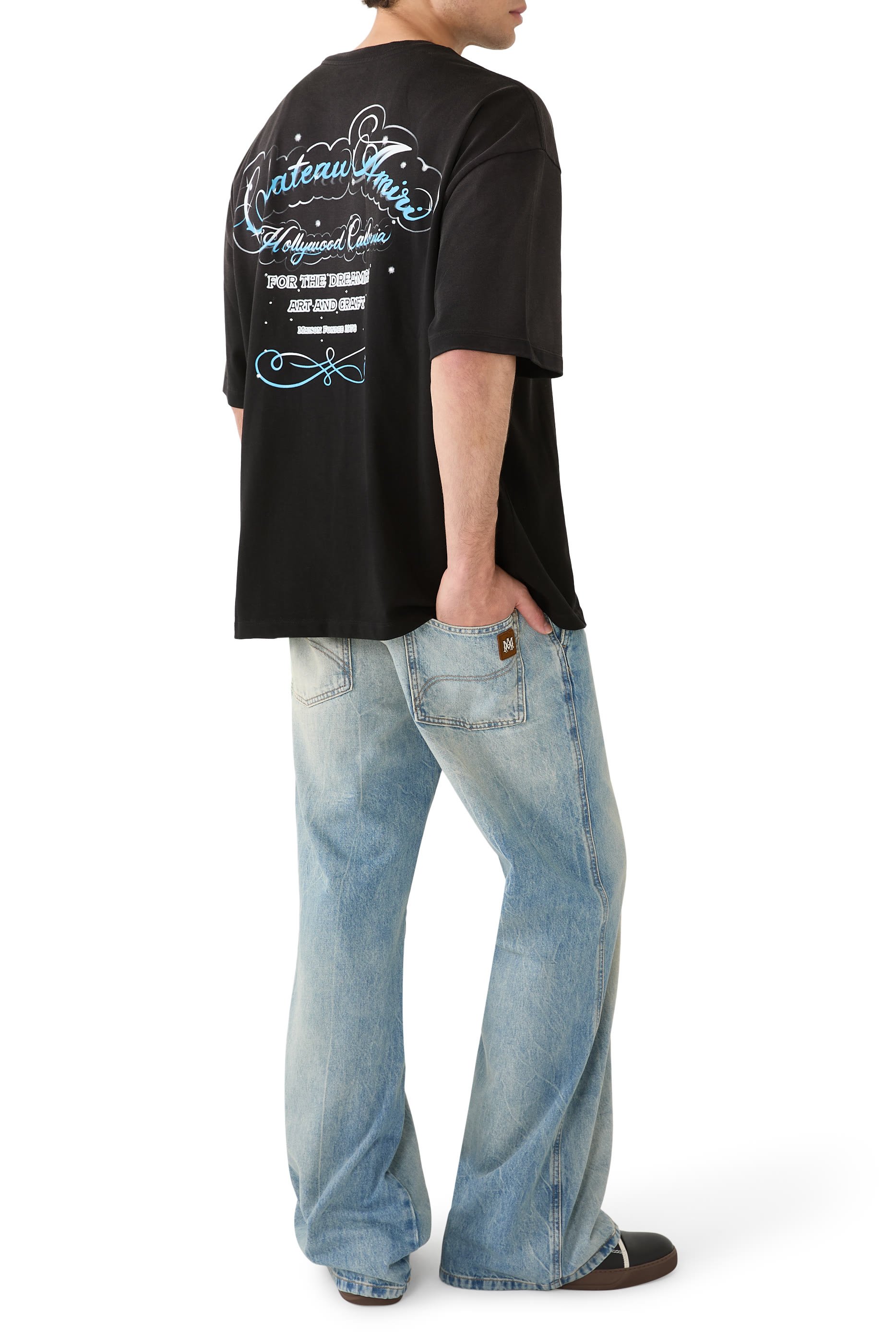 تيشيرت بقصة فضفاضة ونقشة شعار الماركة بكريستال