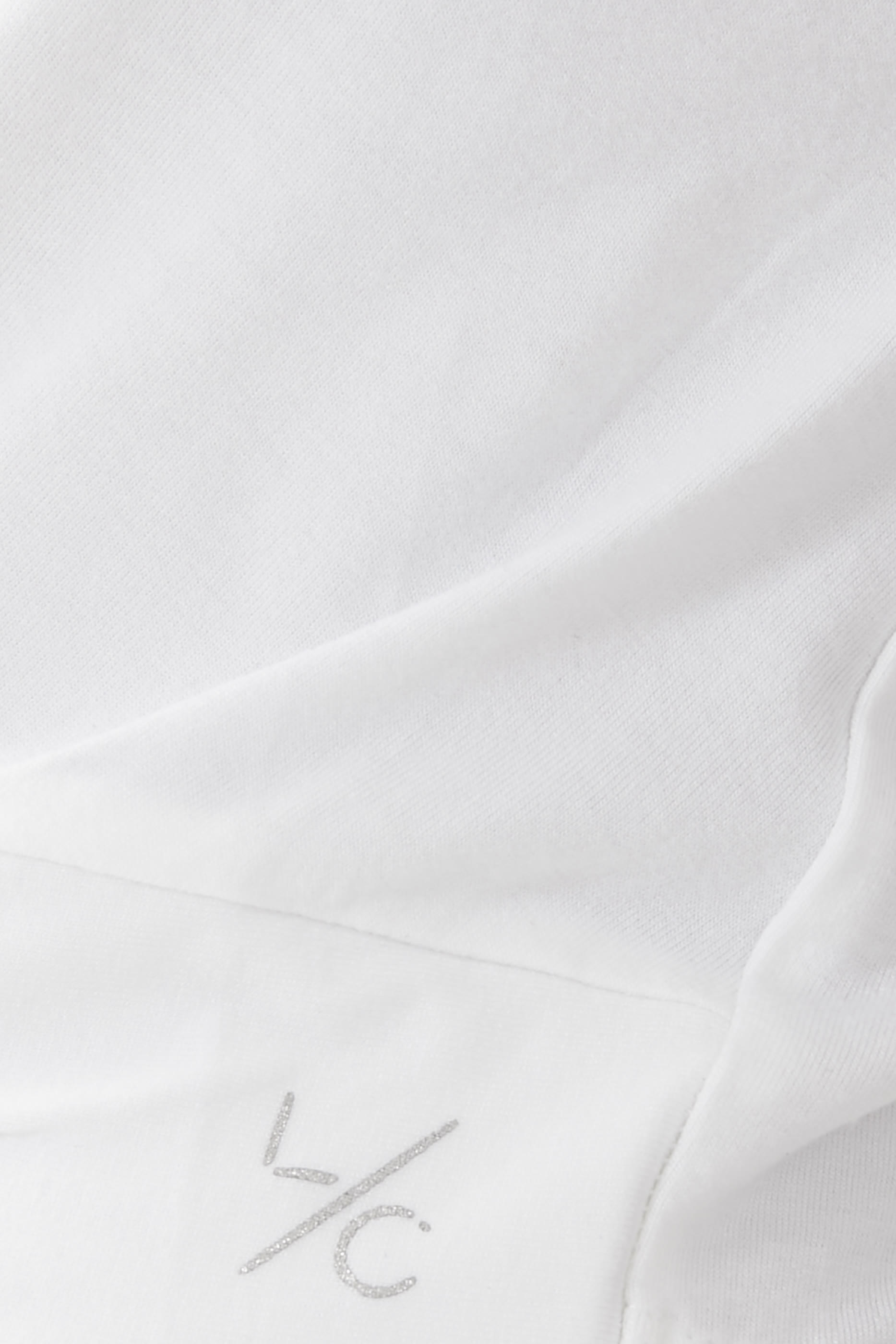 بلوزة الفايت بلا أكمام بعقدة للبيت