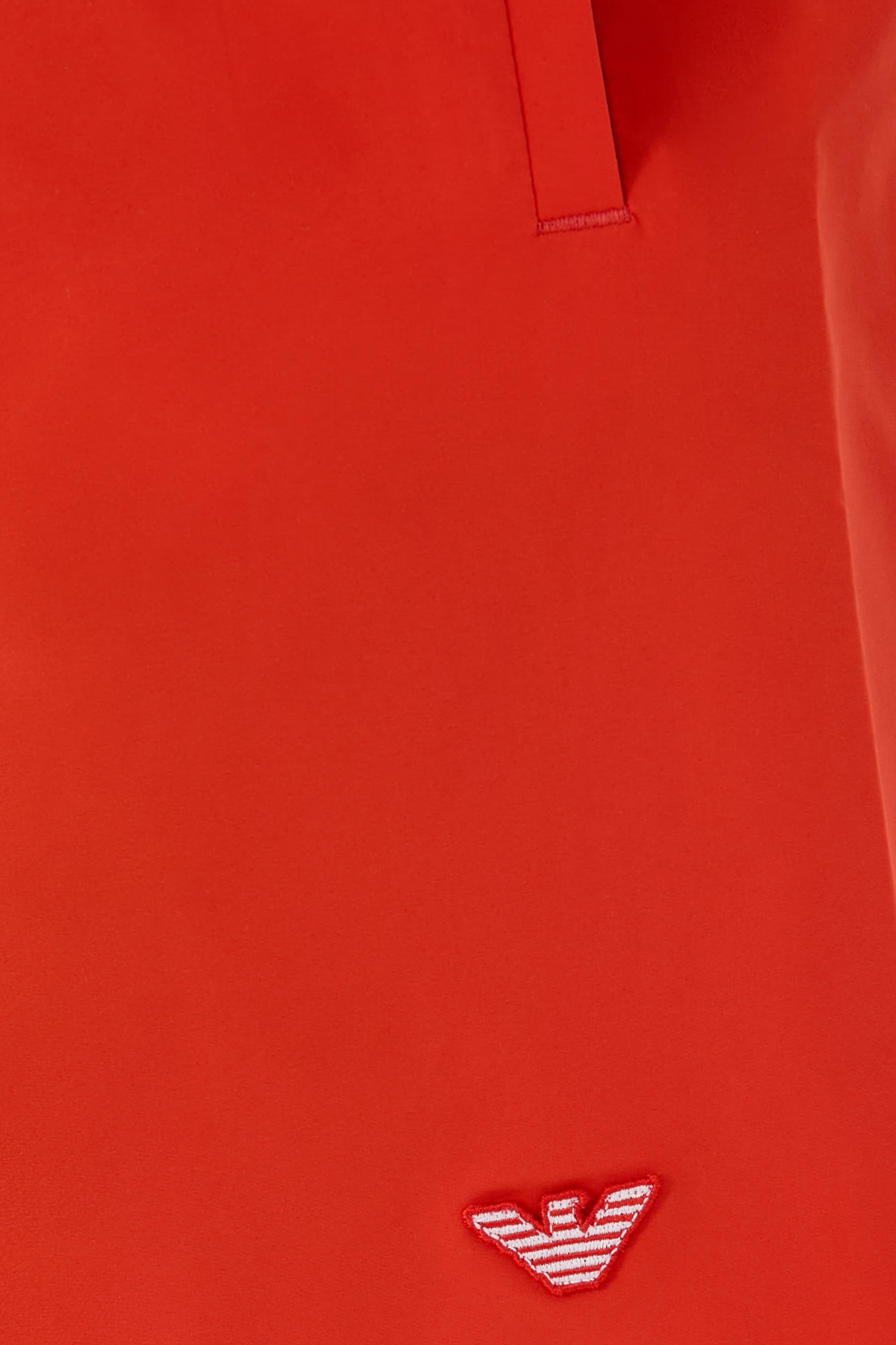 شورت سباحة بشعار الماركة ونسر حجم صغير