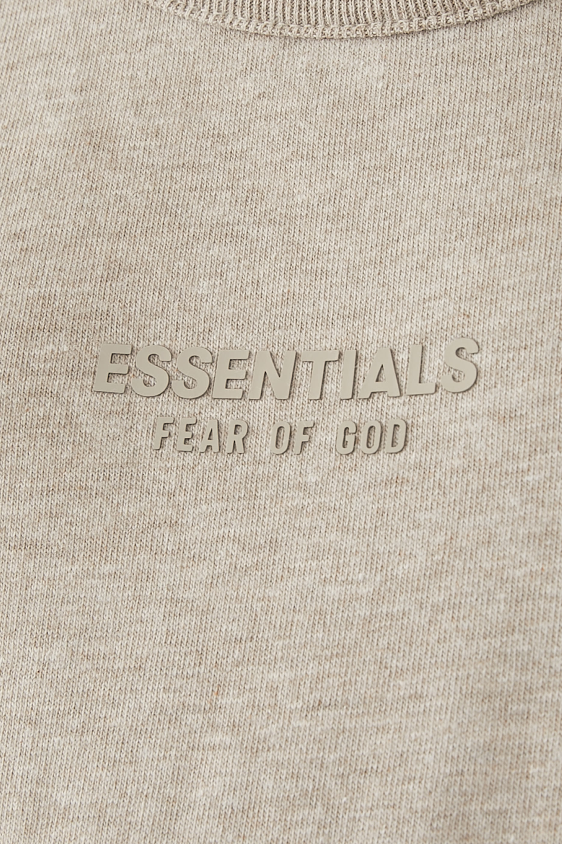 تيشيرت بلا أكمام بشعار اسنشالز