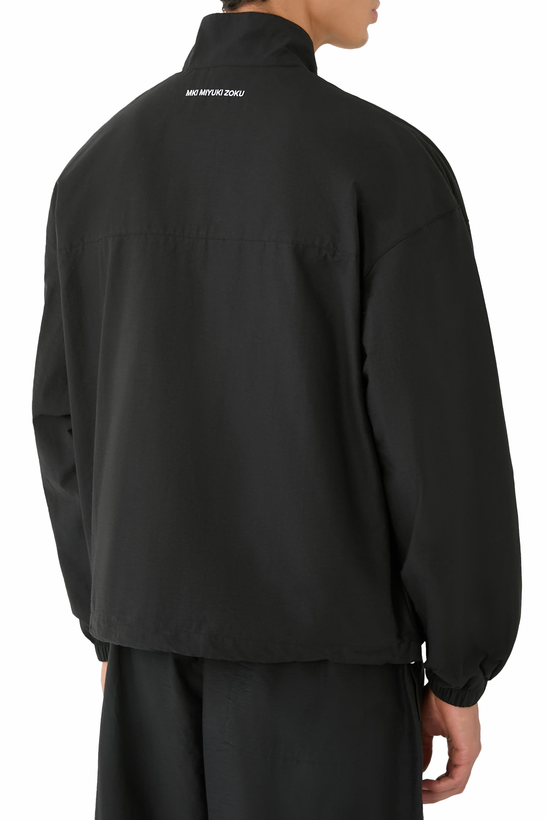 جاكيت رياضي بلون باهت نايلون وقطن