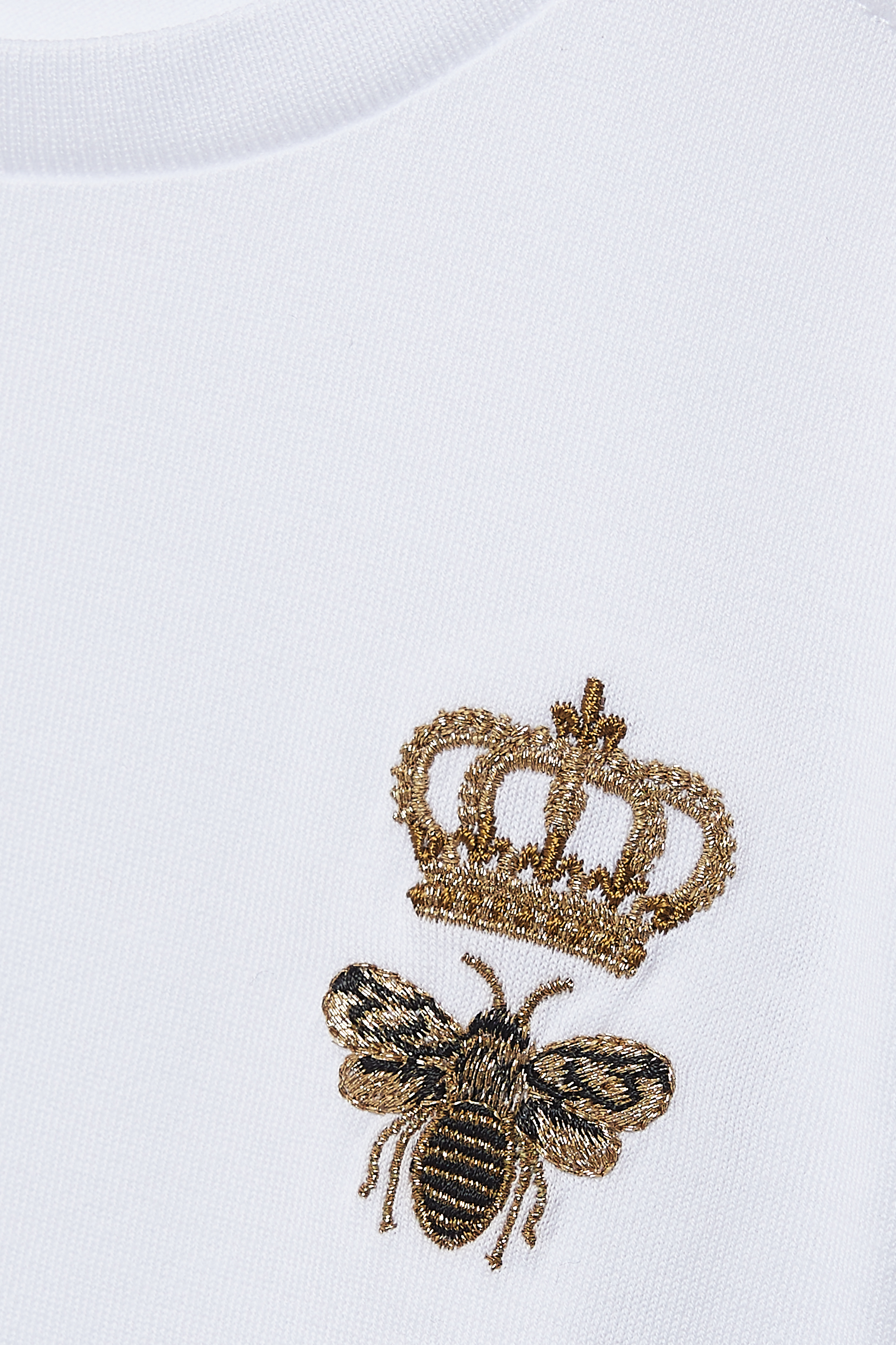 تي شيرت مزين بتاج على الجانب