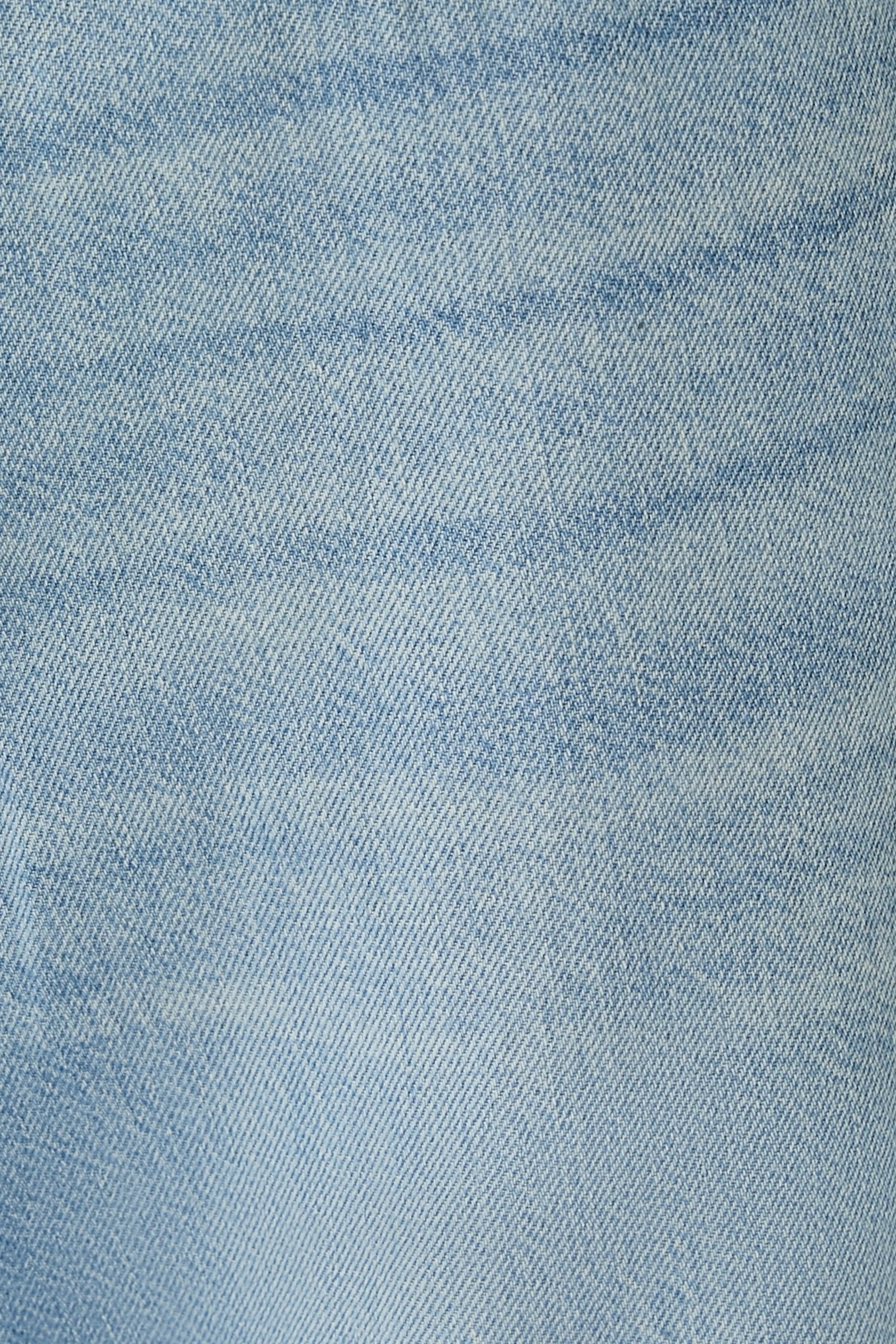 بنطال جينز لوغان بقصة ساق واسعة خامة بخفة الريشة