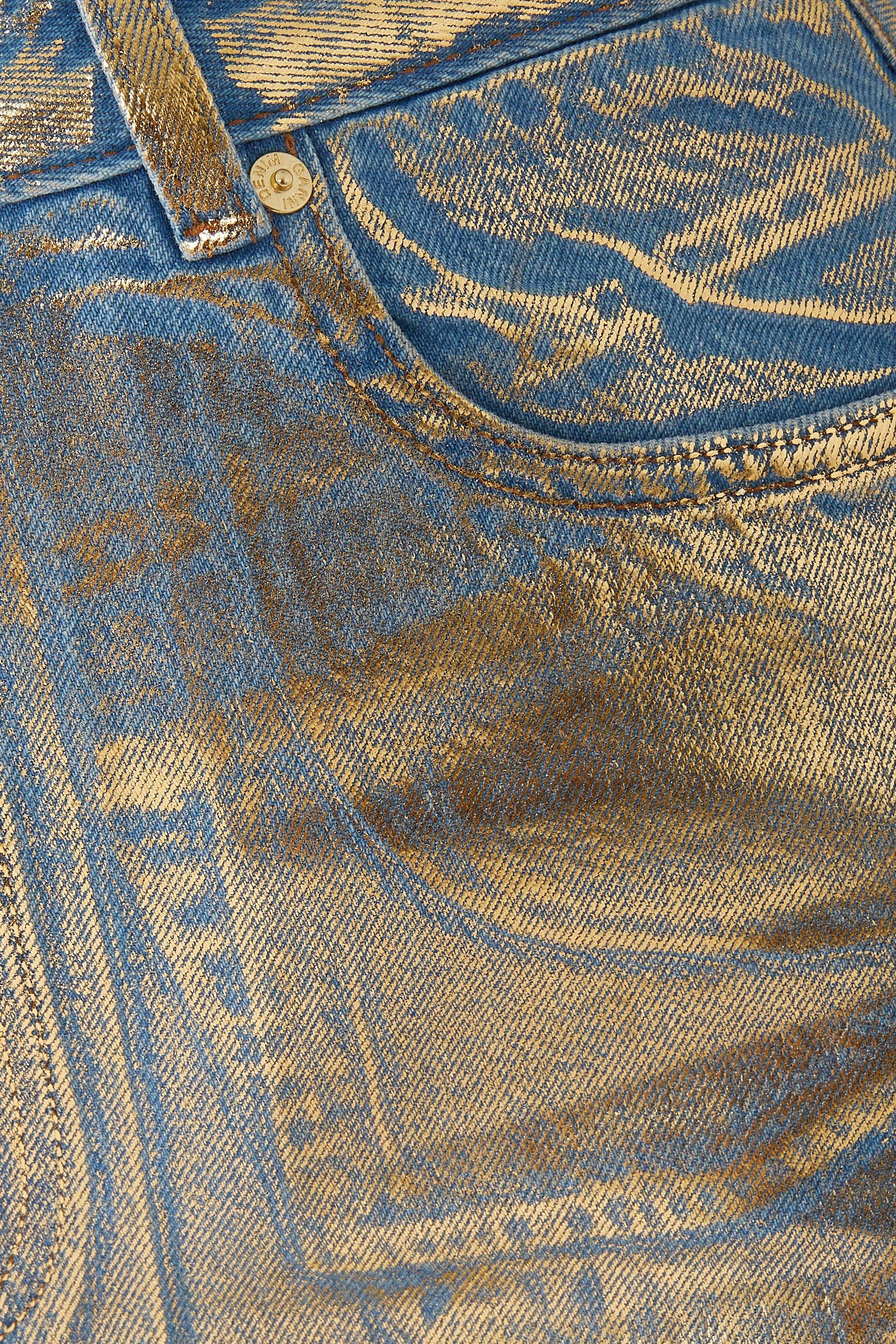 تنورة دنيم متوسطة الطول بلون ذهبي لامع