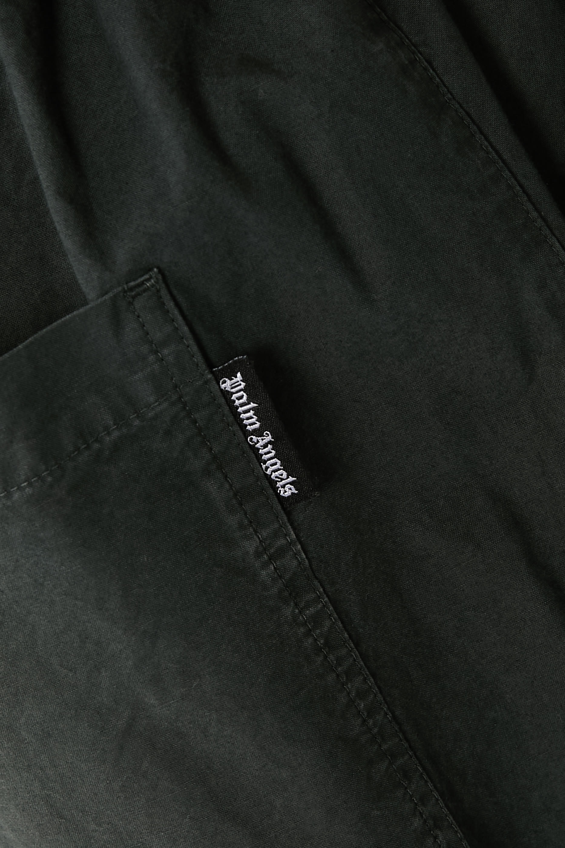  بنطال بقصة فضفاضة وشعار الماركة متموج