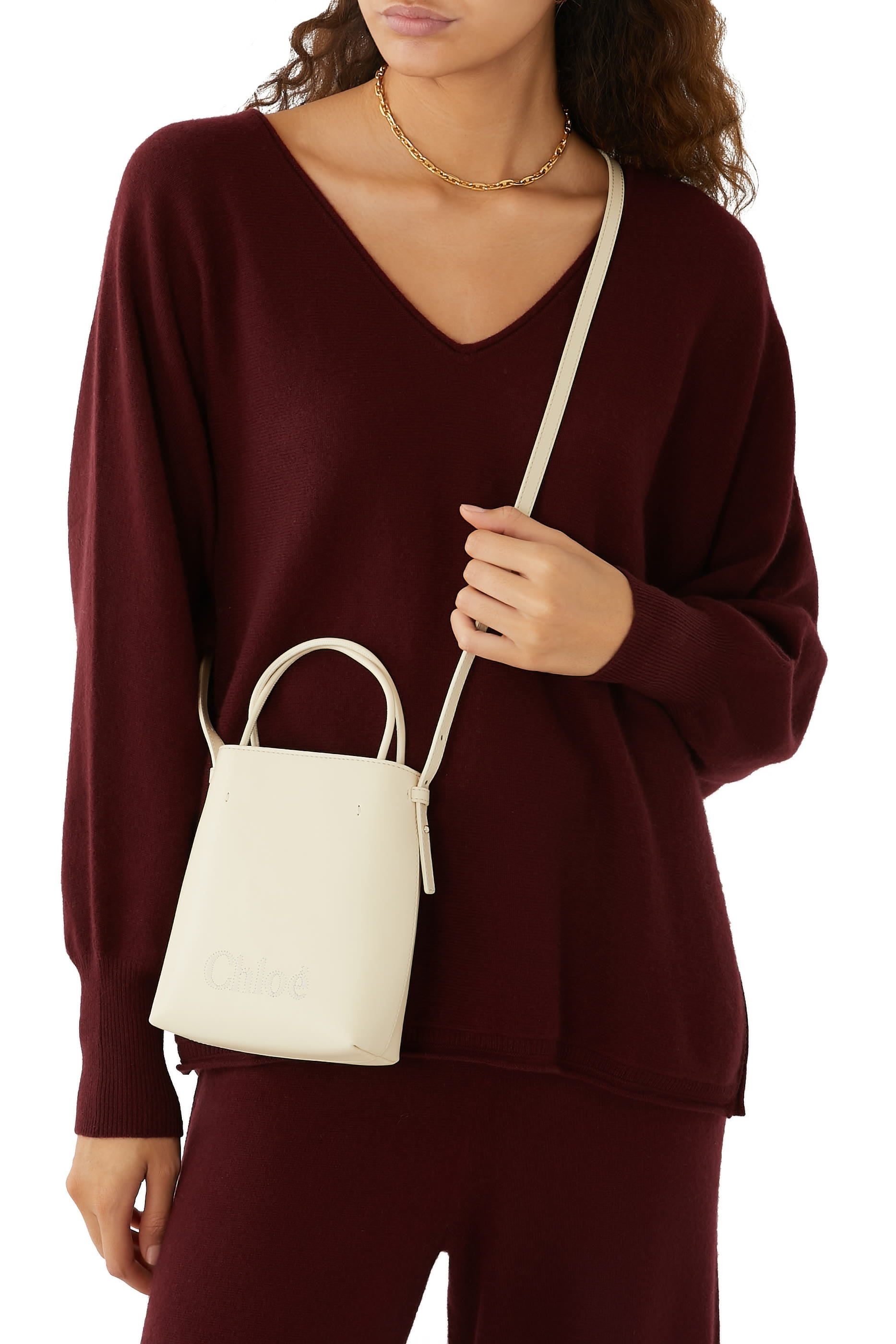 حقيبة سينس صغيرة بشعار الماركة المحاك