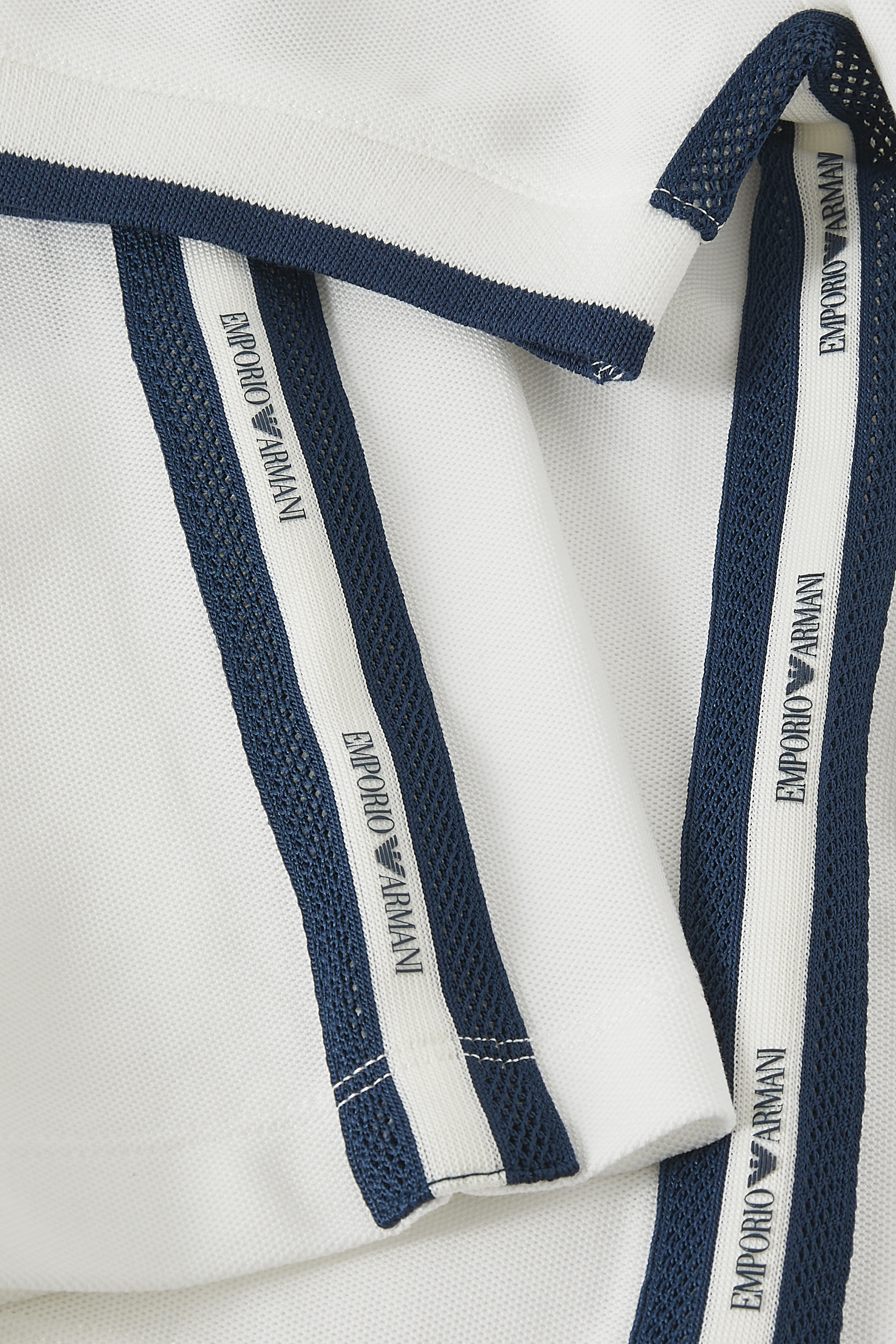 قميص بولو بشعار الماركة للأطفال