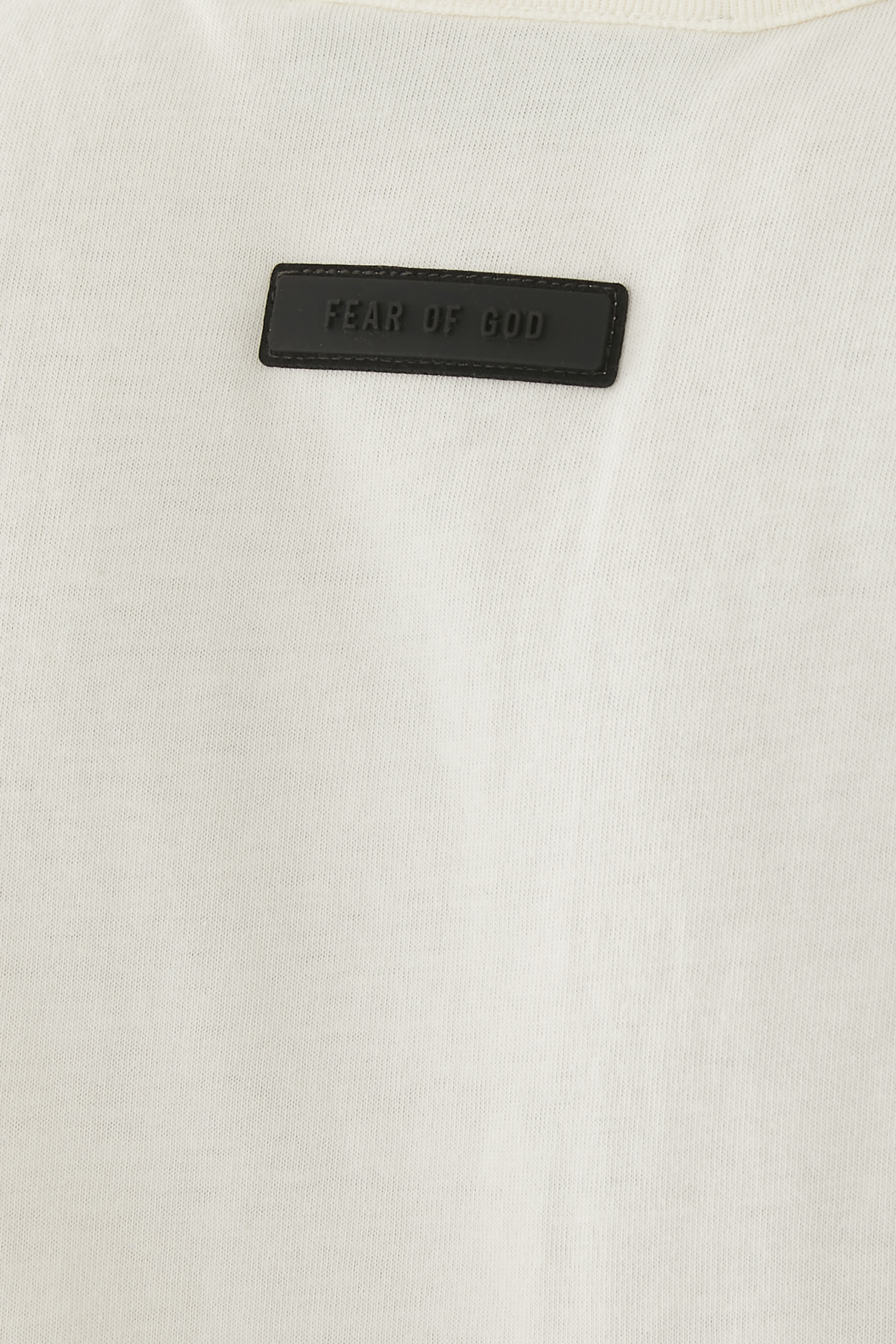 تيشيرت بلا أكمام بشعار اسنشالز