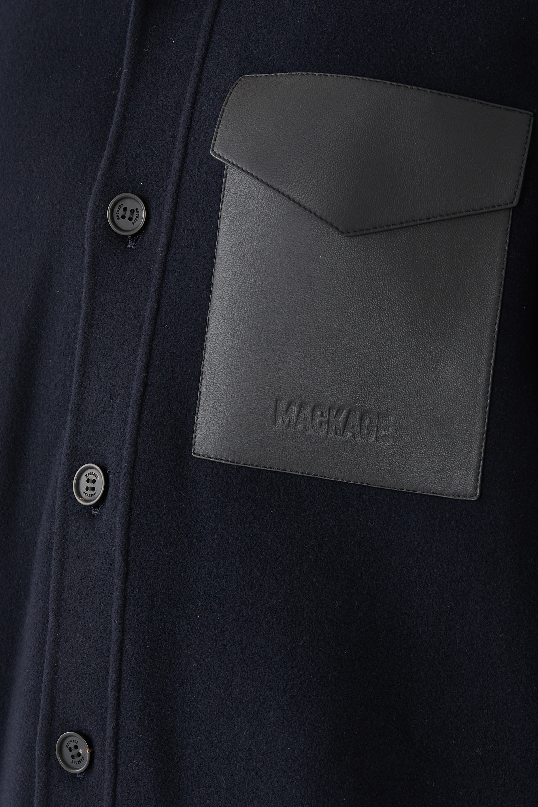 سترة إيمانويل صوف بوجهين مع جيب جلد