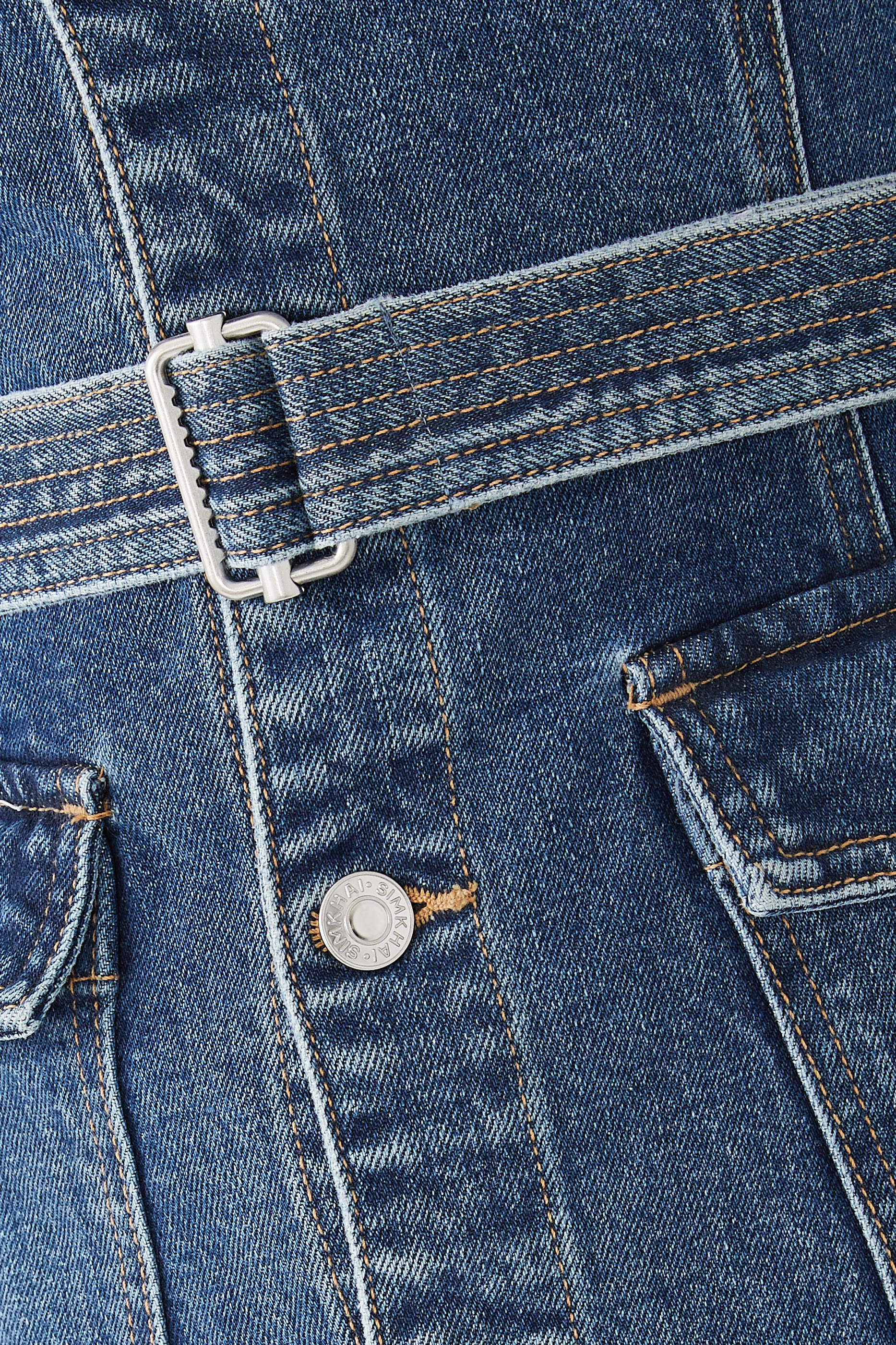 بلوزة سيان بحزام وتصميم صدرية