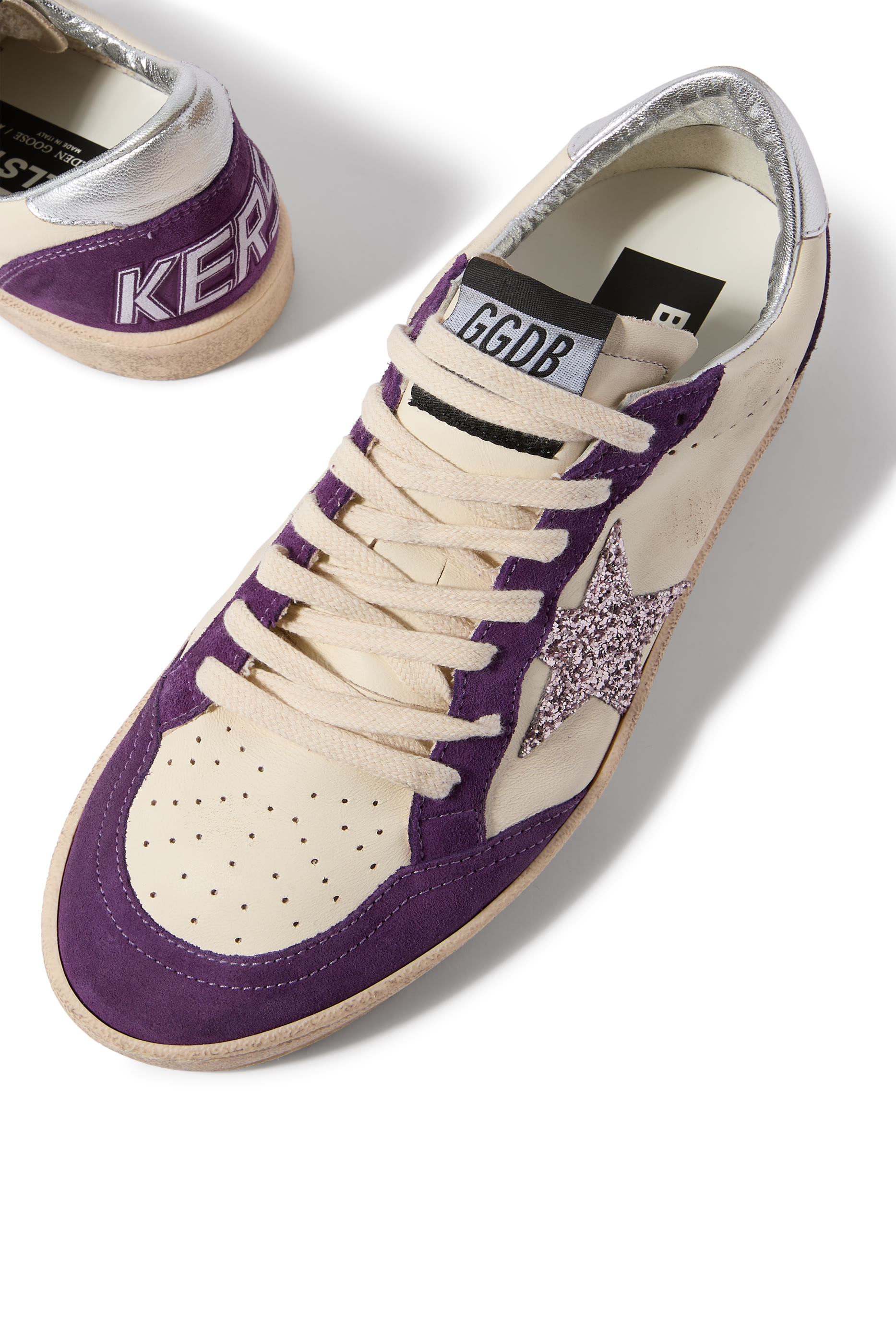 سنيكرز بول ستار برقعة النجمة ذهبية مزينة بغليتر ورقعة فضية أعلى الكعب