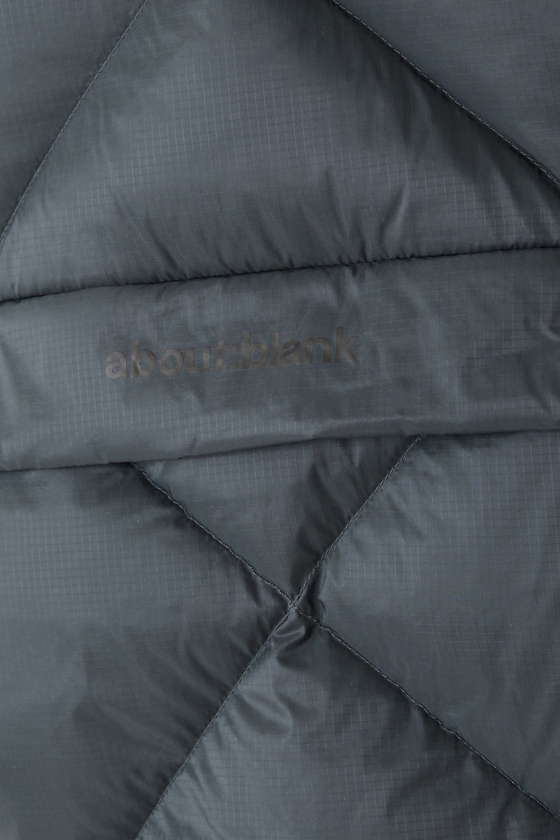 جاكيت بافر مبطن بالزغب بحياكة بتصميم معينات