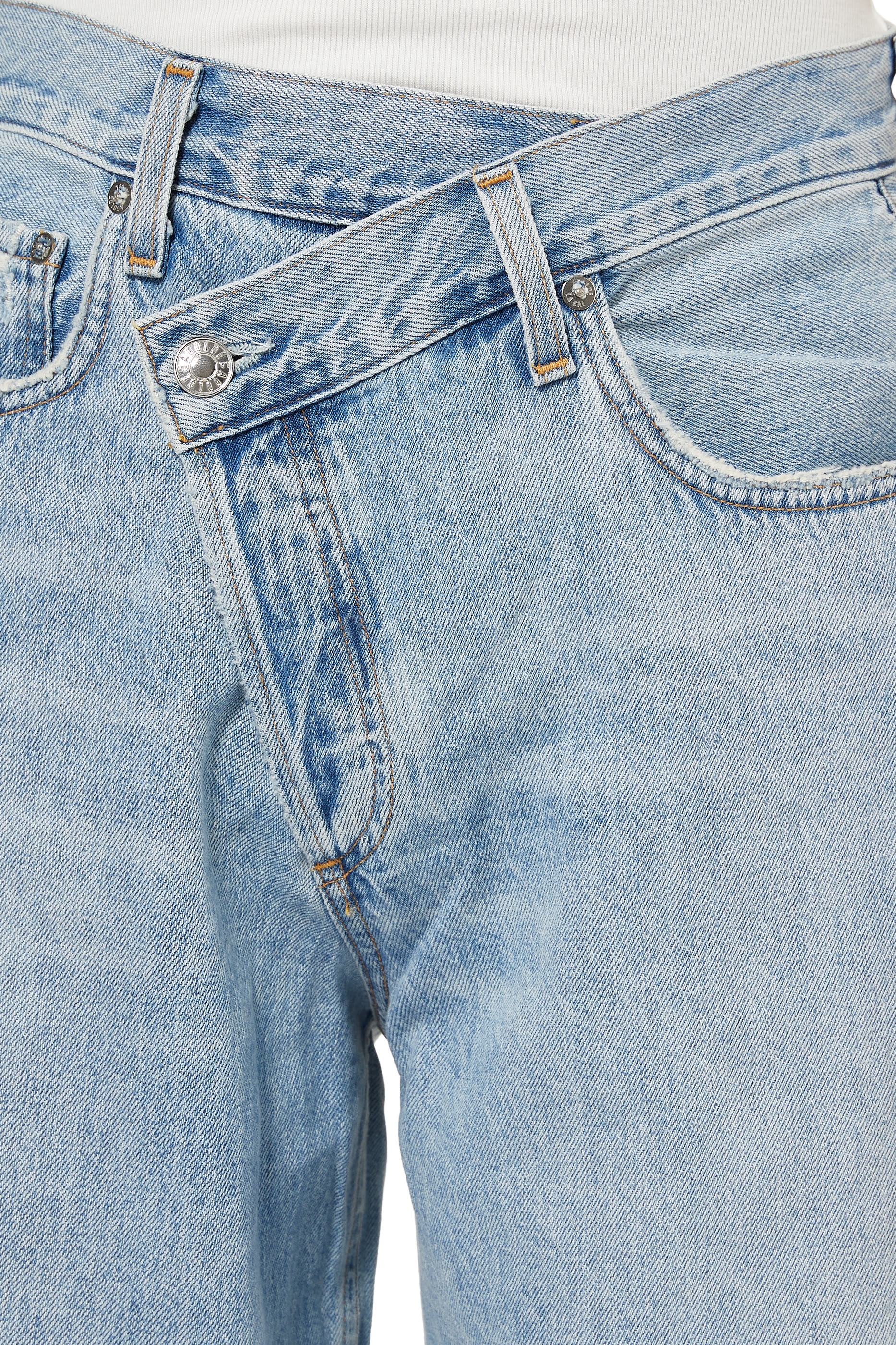 بنطال جينز بتصميم متقاطع وقصة واسعة