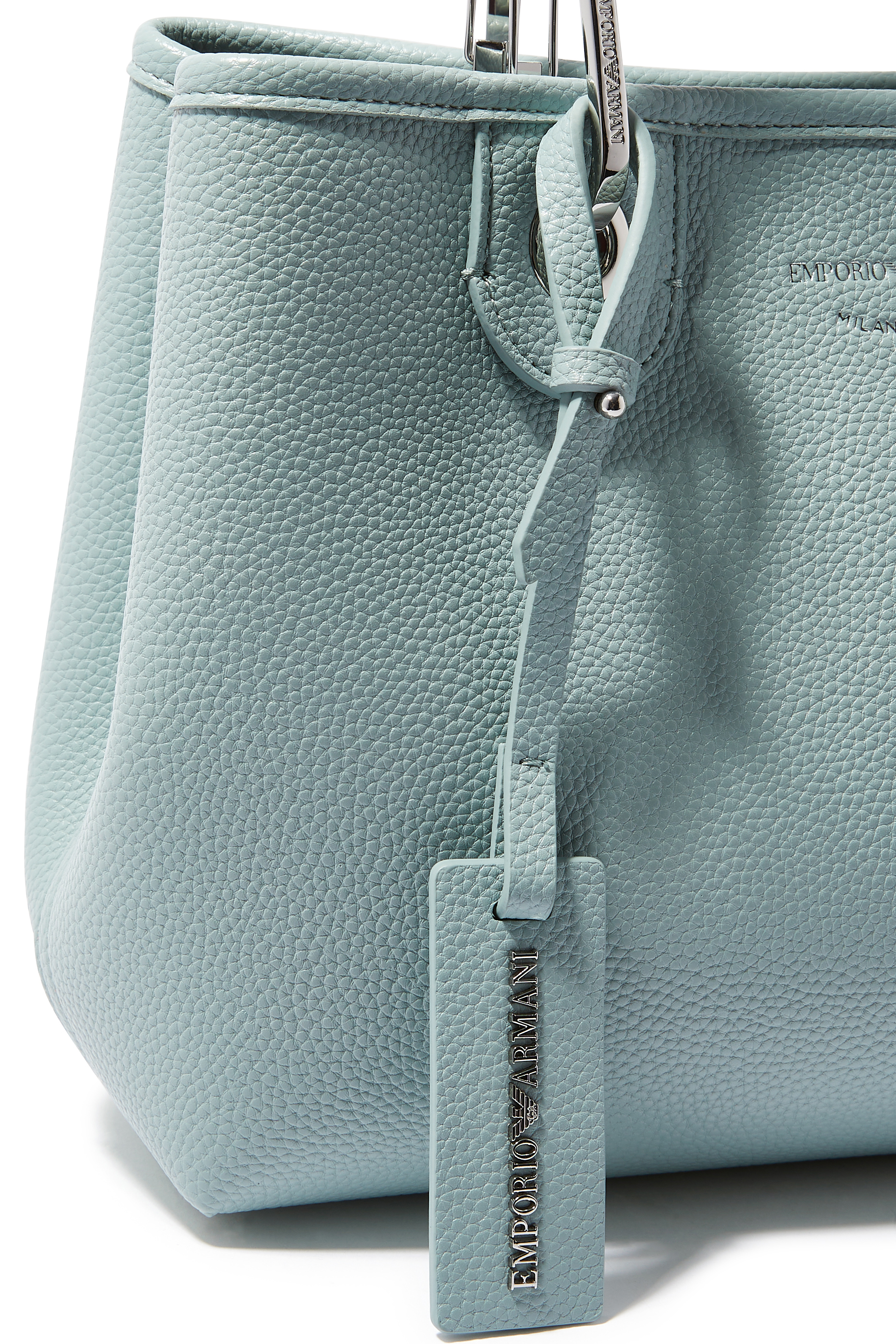 حقيبة صغيرة بطبعات بارزة بشعار الماركة