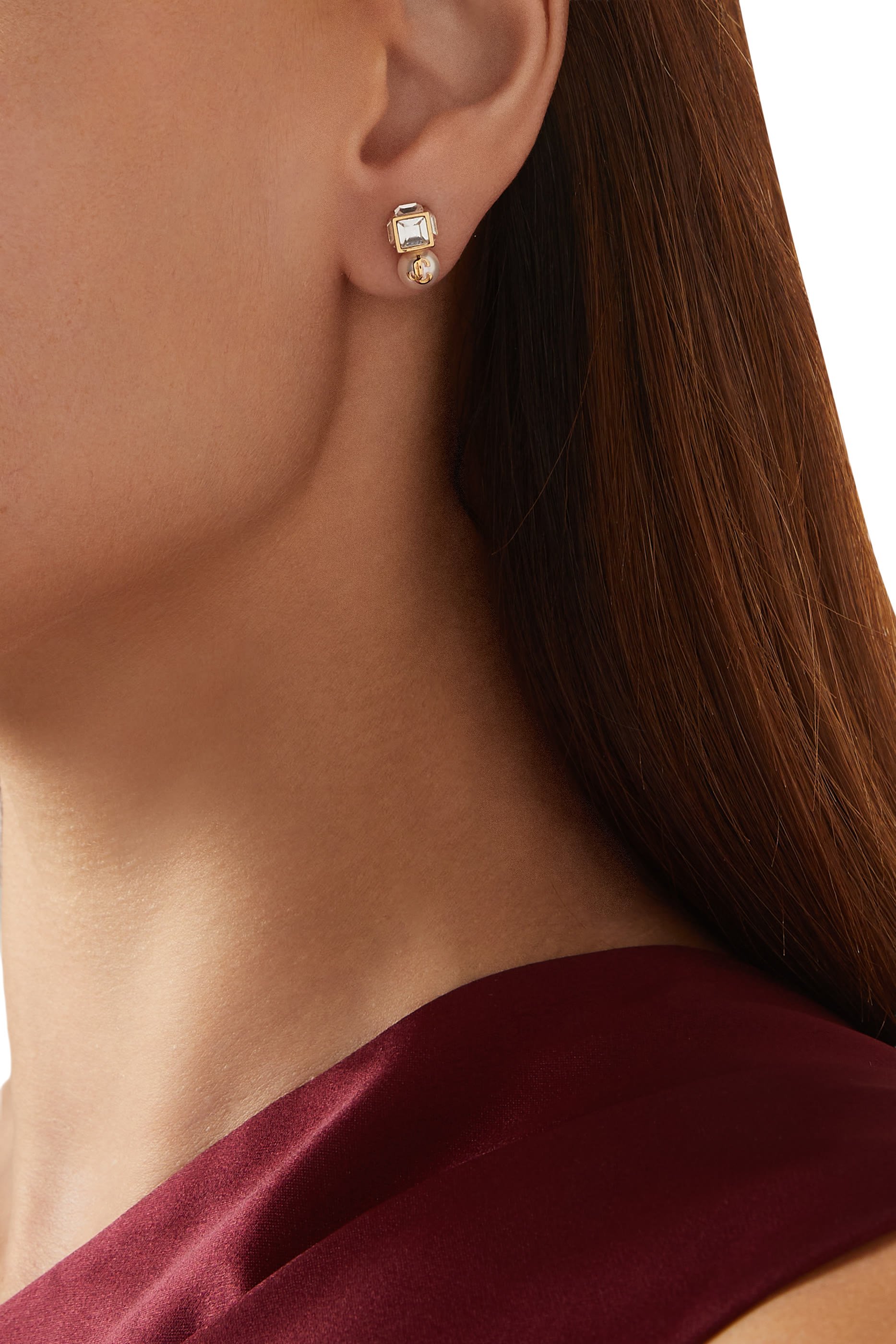 أقراط بتصميم كعب مزينة بلؤلؤ