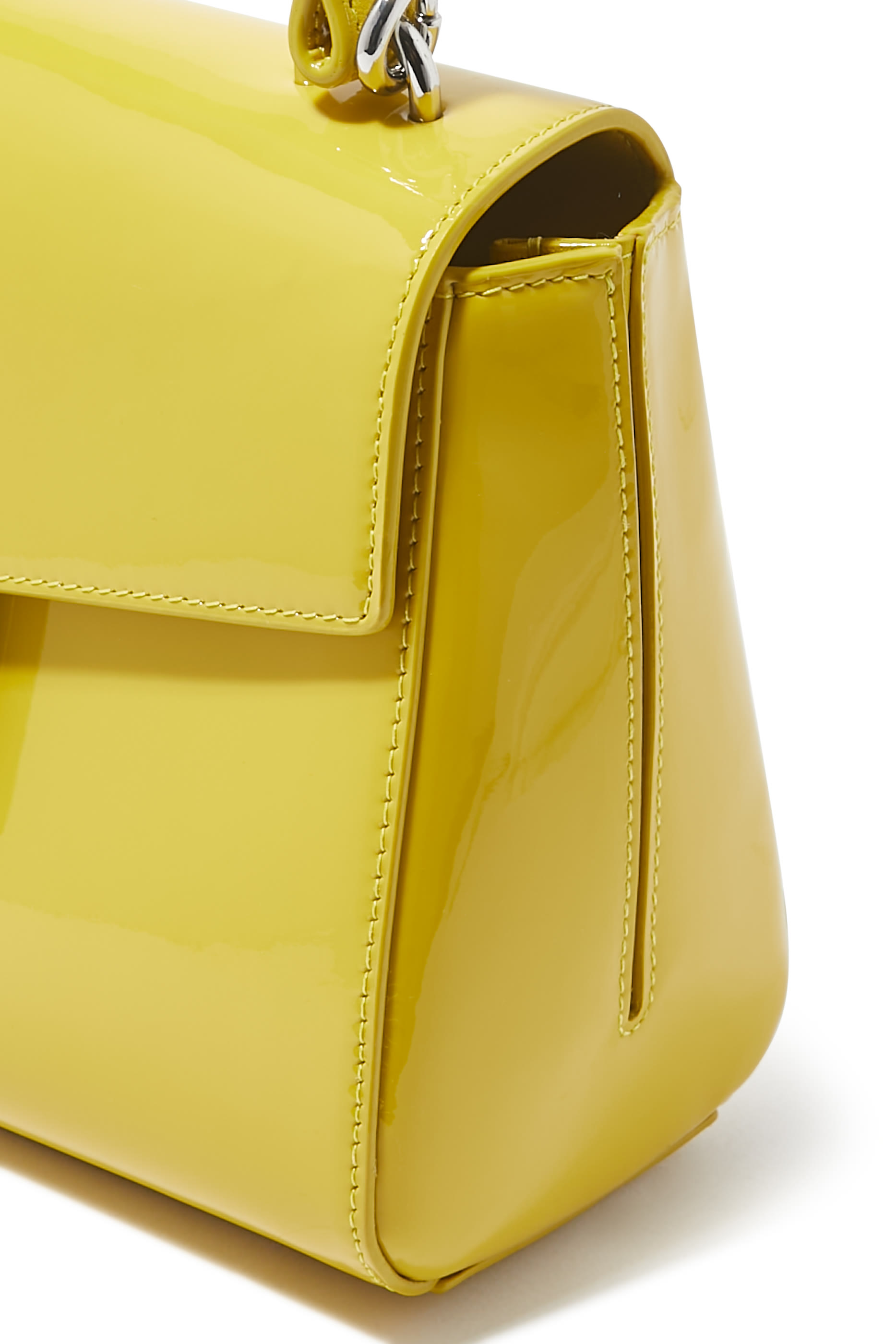 حقيبة كاتي صغيرة بيد علوية جلد لامع