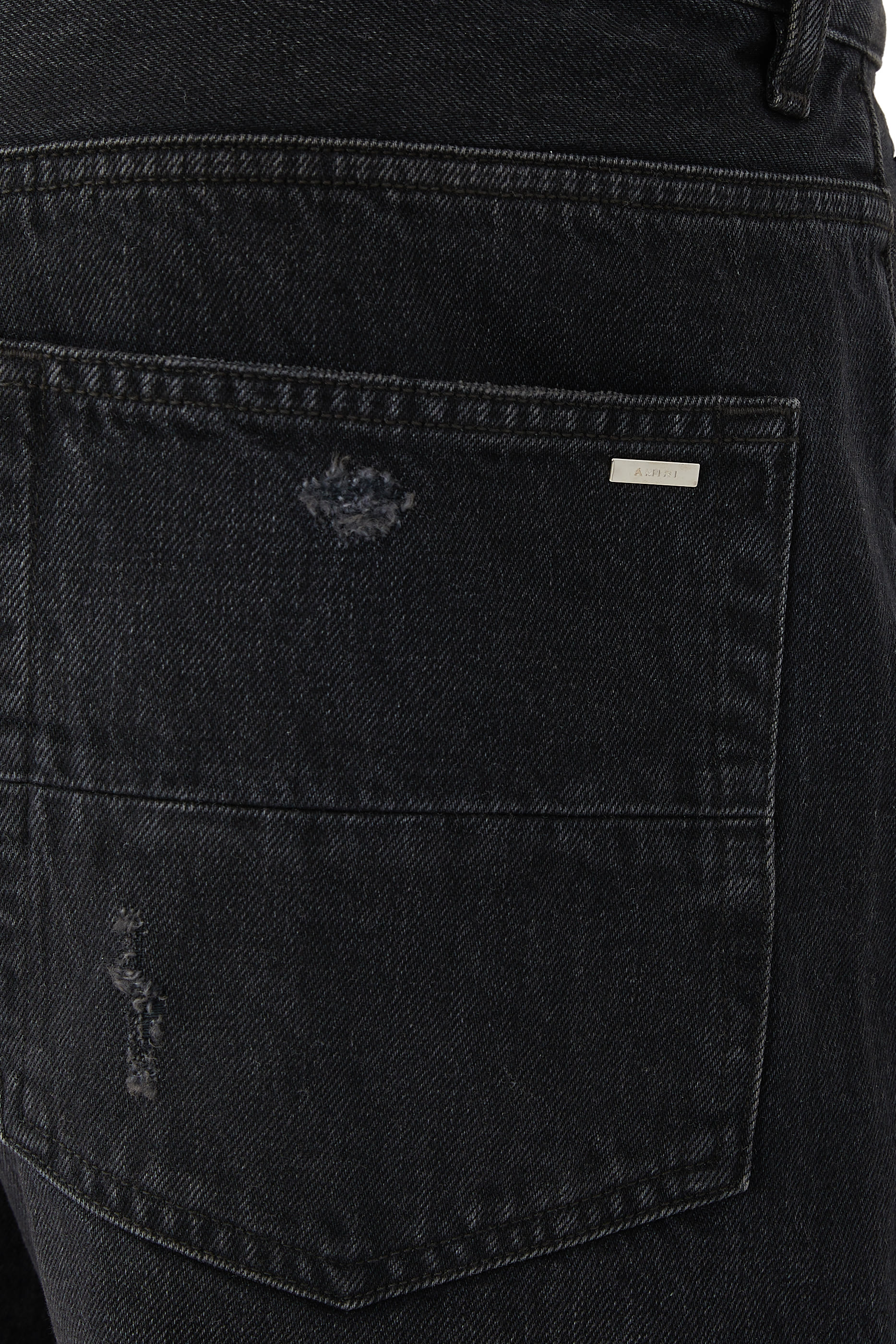 بنطال بقصة ساق مستقيمة وحافة غير محاكة