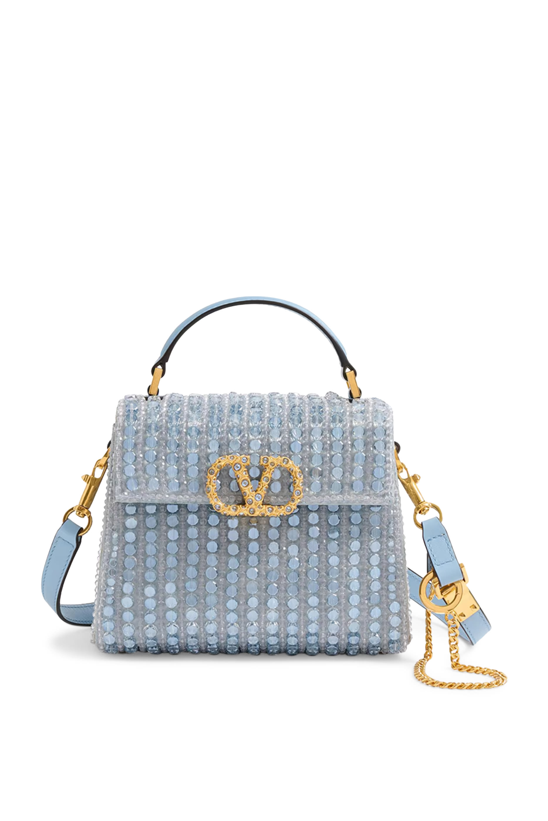 حقيب يد صغيرة مرصعة بأحجار ومزينة بحرف شعار الماركة 