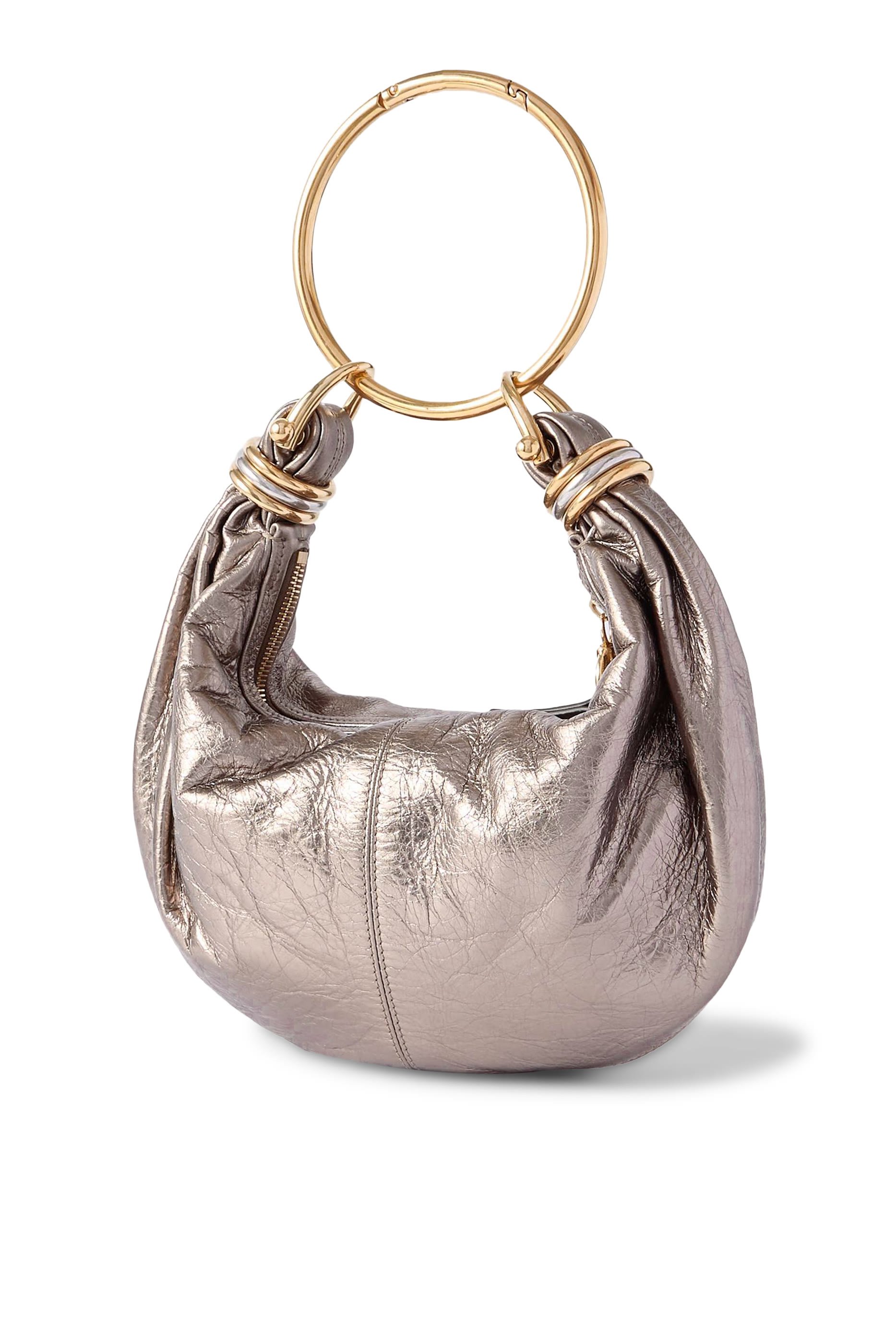 حقيبة هوبو صغيرة ببيد على شكل سوار