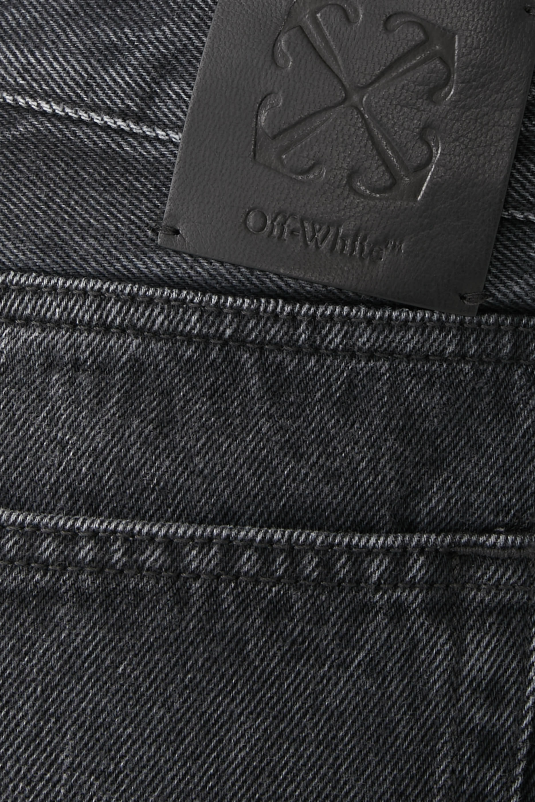 بنطال جينز سكيت بسحاب وشعار الأسهم