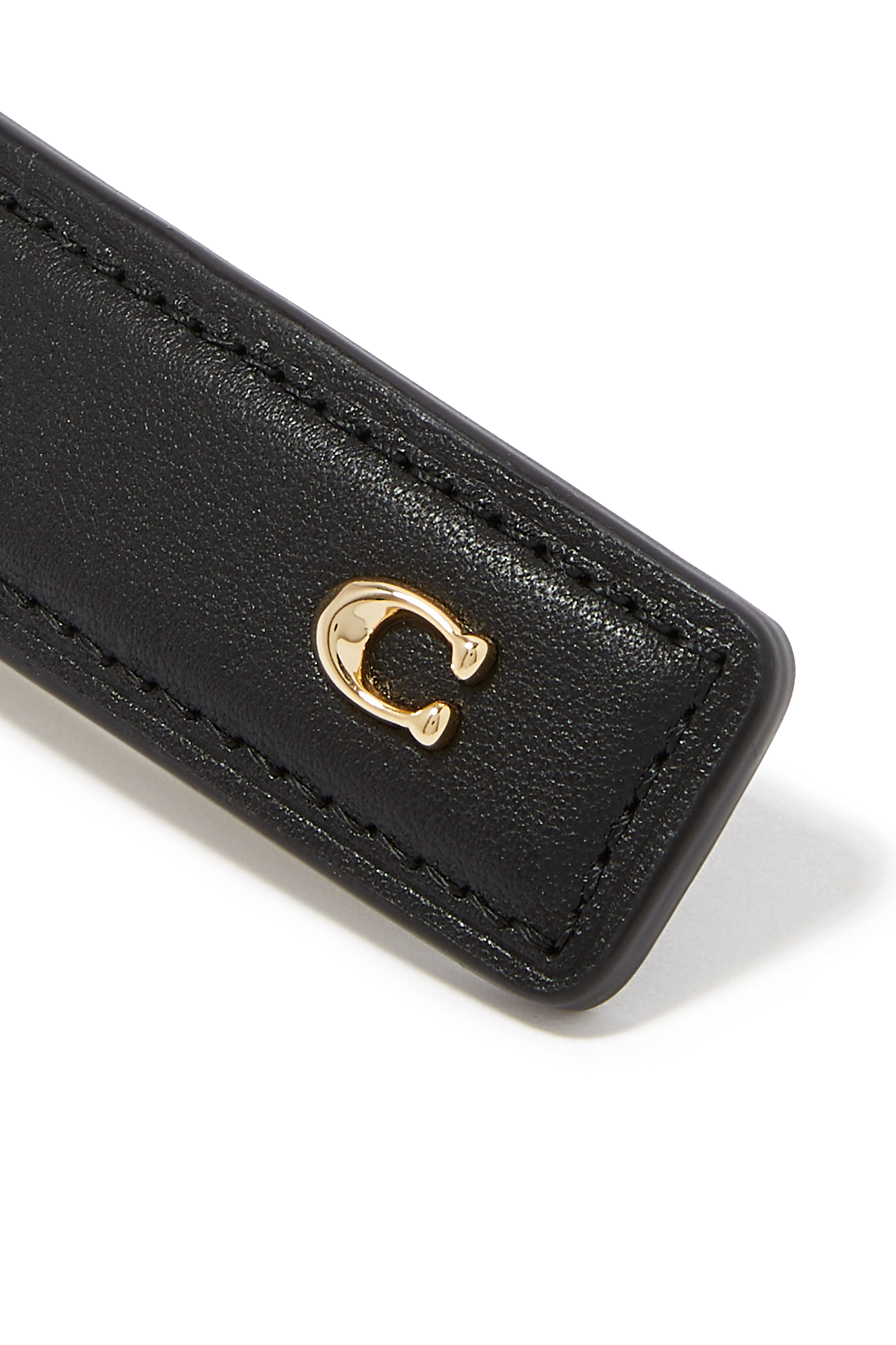 مشبك جلد بحلية شعار الماركة وأحجار زركونيا مكعبة، نحاس مطلي وراتنج