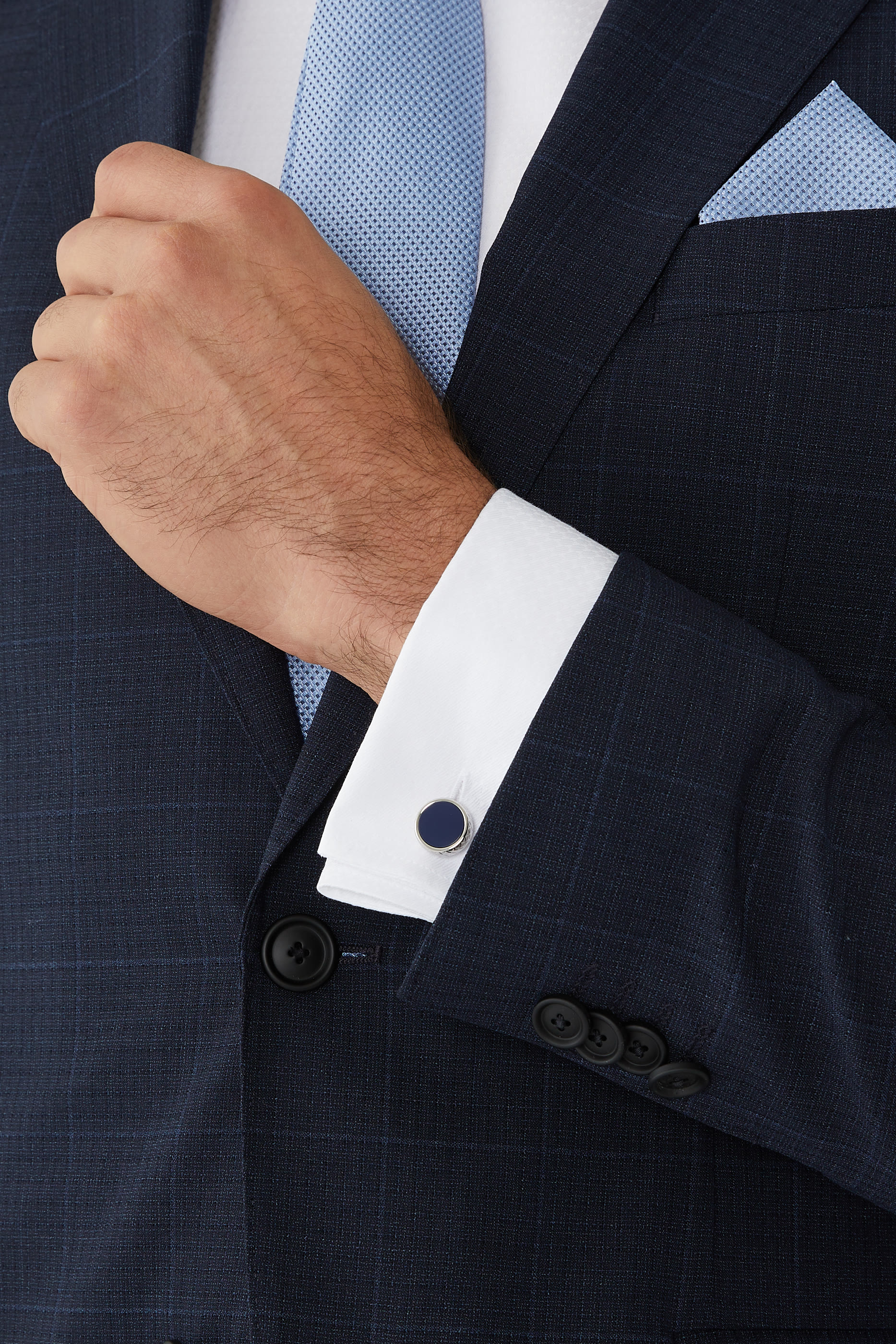 أزرار أكمام خورخي مستديرة