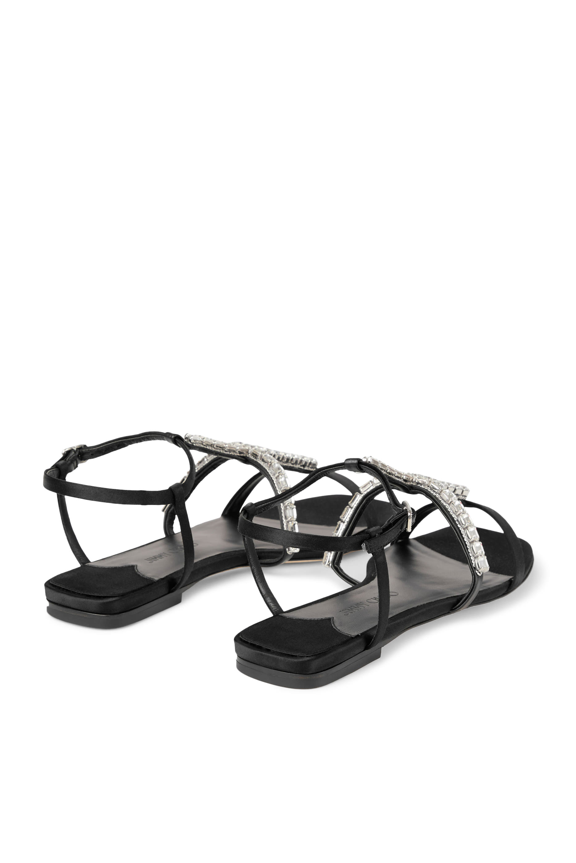 صندل بكعب مسطح وسيور بتصميم حرف T بالكريستال